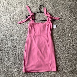 Brand new, with tags, pink cocktail dress
